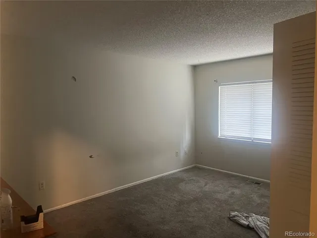 an empty room with a workbench