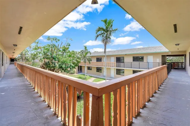 a view of a house with wooden stairs