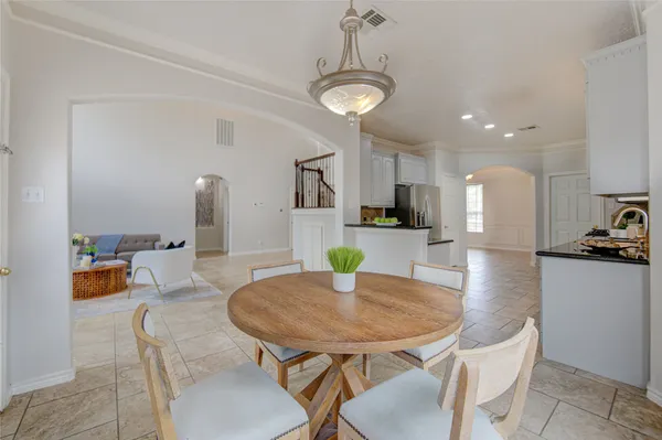a view of a dining room with furniture