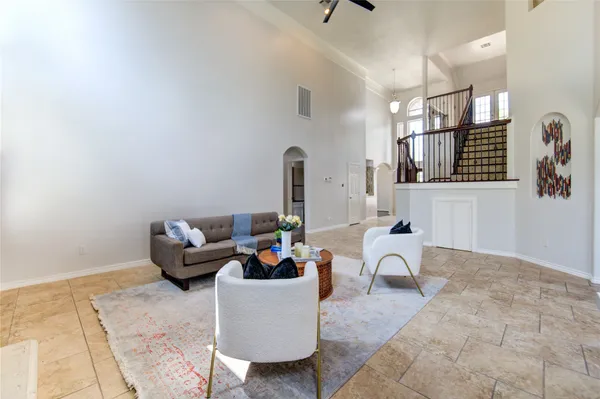 a living room with furniture and window
