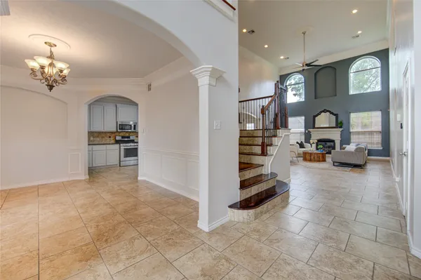 a view of livingroom with kitchen and furniture