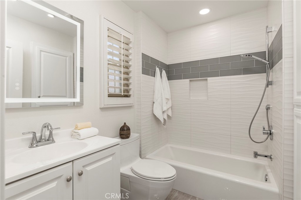52 Scarlet Bloom Irvine, CA 92618 - Photo 20 of 43 Guest Bathroom
Tiled Bath Walls