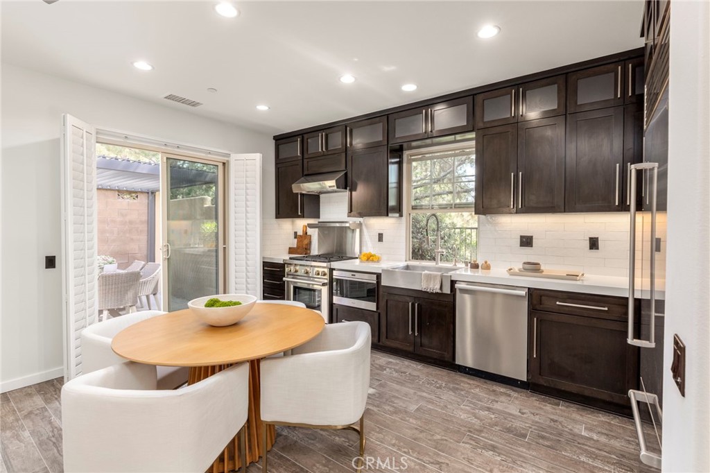 52 Scarlet Bloom Irvine, CA 92618 - Photo 9 of 43 Sparkling Kitchen Counters and New Tile Backsplash