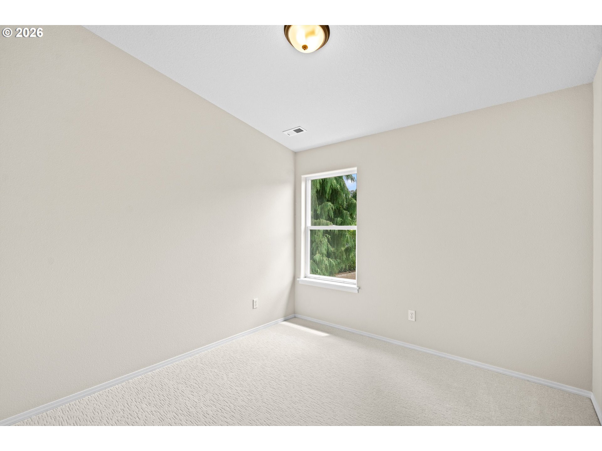 462 Southwest 211th Avenue Beaverton, OR 97006 - Photo 28 of 40 a view of an empty room with a window