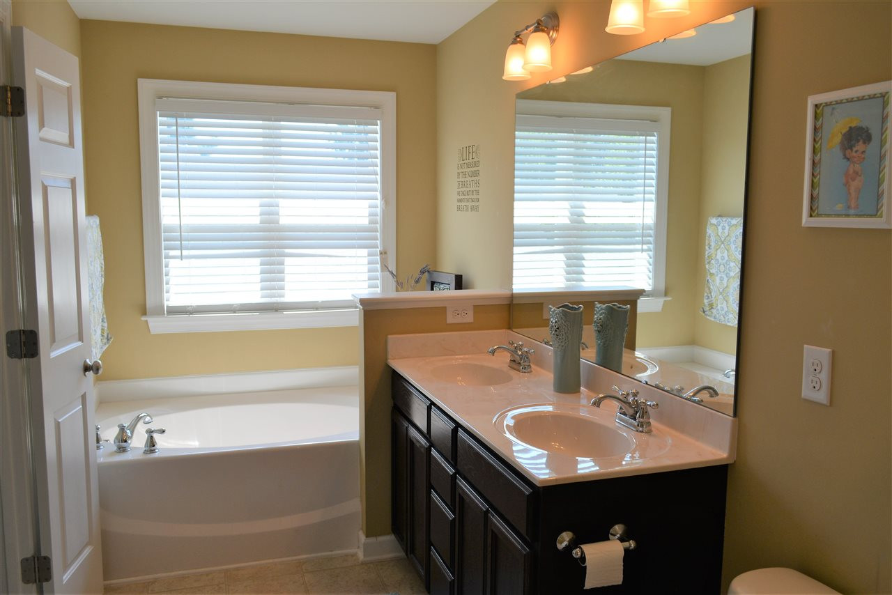 2003 Chancellor Place Raleigh, NC 27603 - Photo 17 of 30 Luxurious Spa bathroom with soaking tub