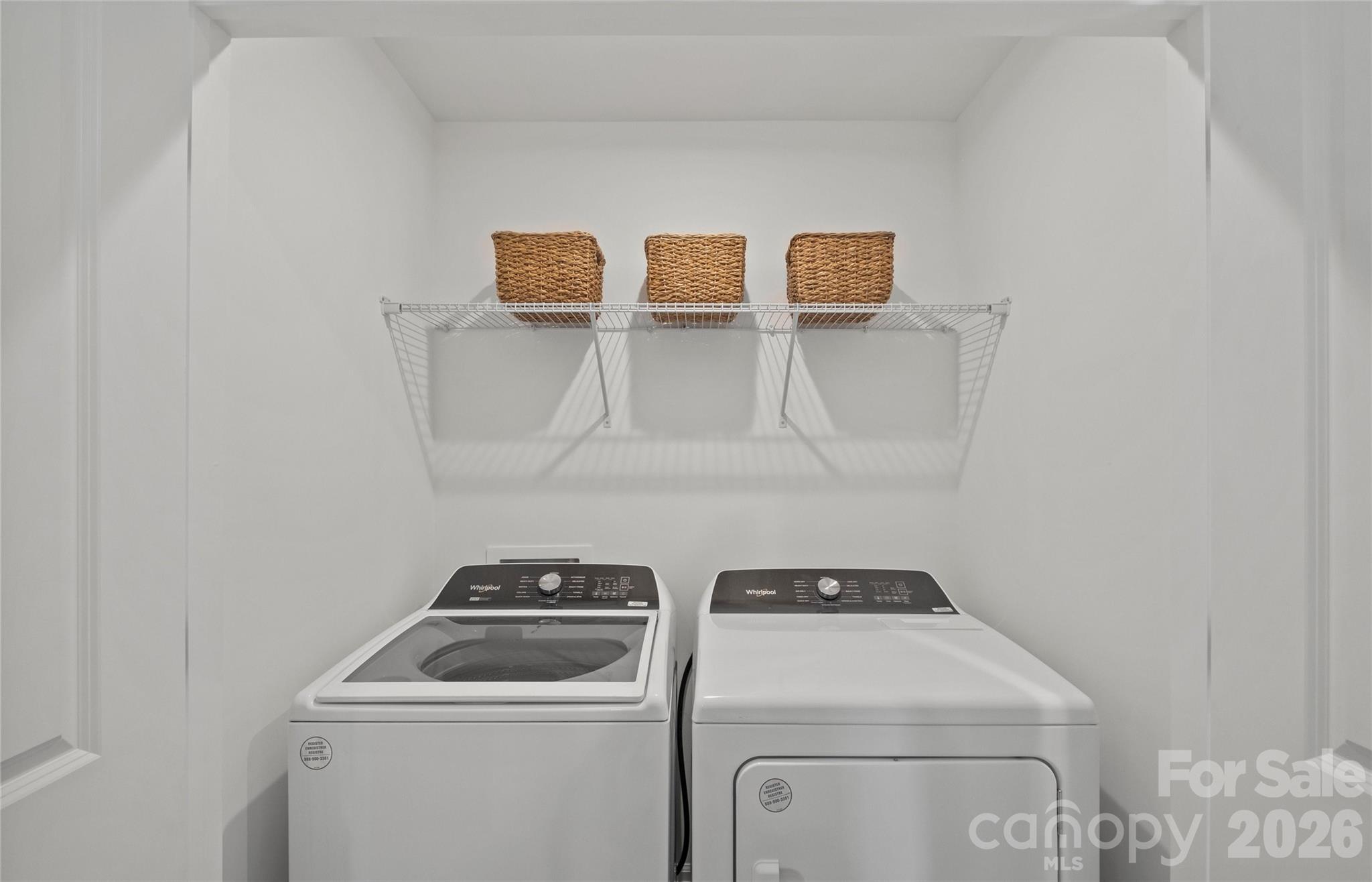 2104 Cobble Court, Unit 177 Monroe, NC 28110 - Photo 8 of 8 a view of storage and utility room with washer and dryer