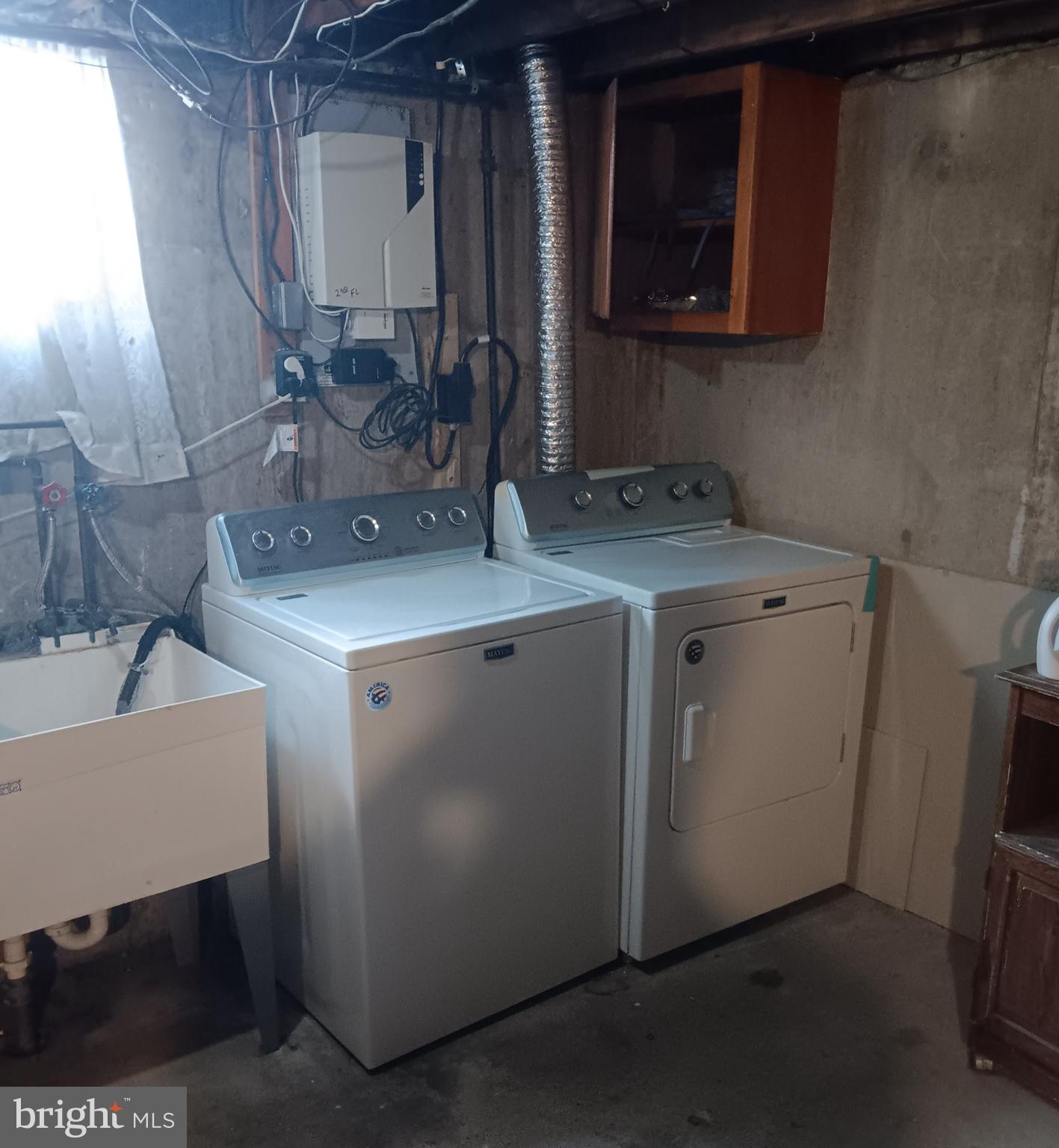 153 Burmont Road, Unit B Drexel Hill, PA 19026 - Photo 17 of 19 a room with sink and washing machine