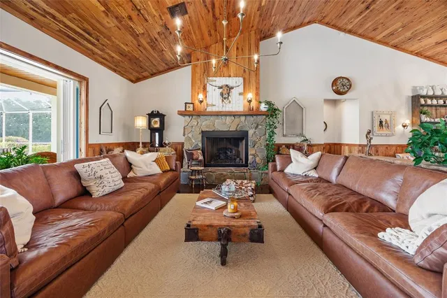 a view of swimming pool with outdoor seating