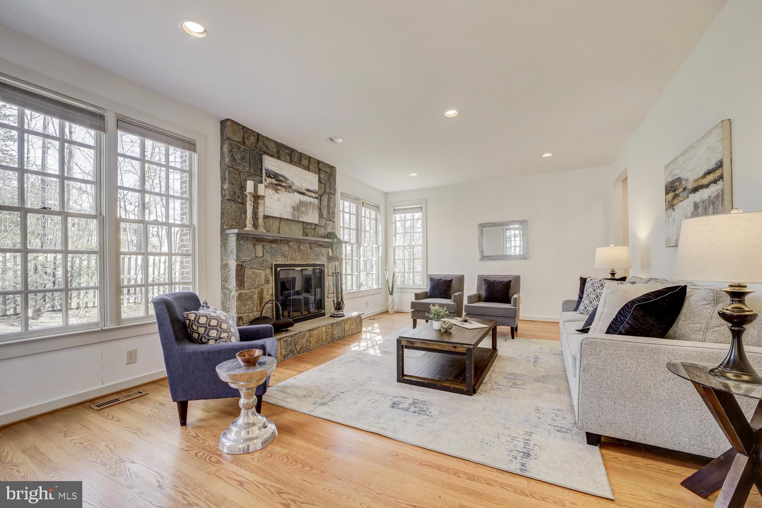 10505 Democracy Lane Potomac, MD 20854 - Photo 21 of 47 a living room with furniture fireplace and window