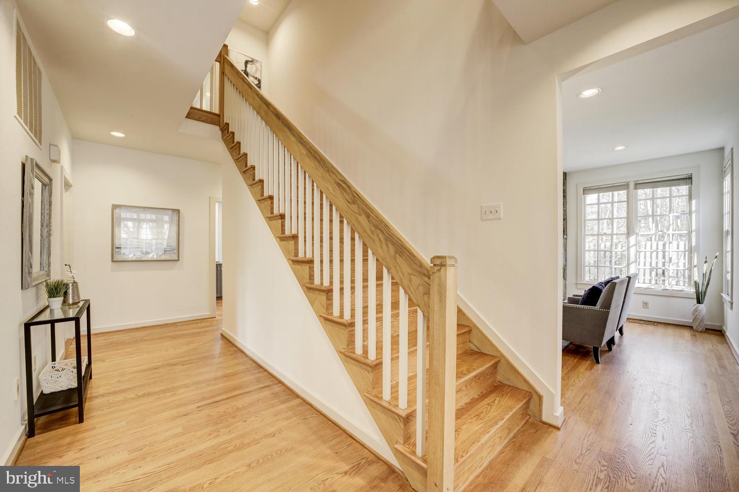 10505 Democracy Lane Potomac, MD 20854 - Photo 23 of 47 a view of entryway and hall with wooden floor