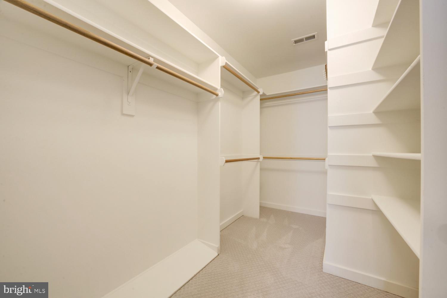 10505 Democracy Lane Potomac, MD 20854 - Photo 30 of 47 a view of an empty walk in closet