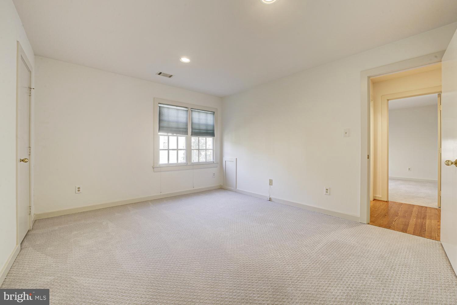 10505 Democracy Lane Potomac, MD 20854 - Photo 31 of 47 an empty room with windows