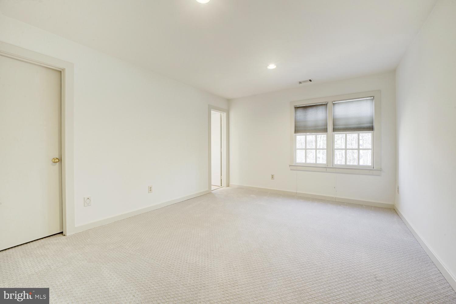 10505 Democracy Lane Potomac, MD 20854 - Photo 33 of 47 an empty room with windows and closet