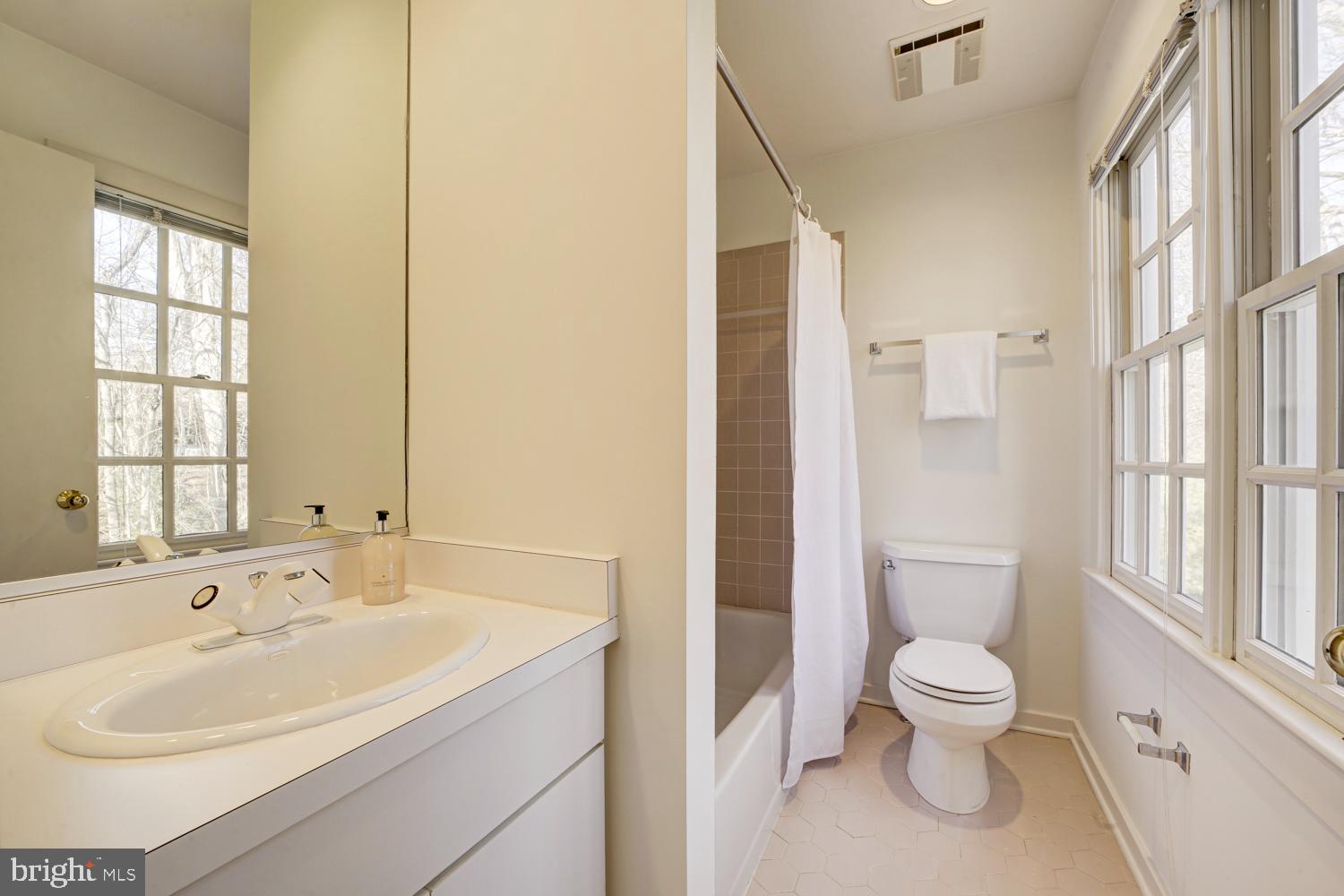 10505 Democracy Lane Potomac, MD 20854 - Photo 34 of 47 a bathroom with a sink toilet and shower