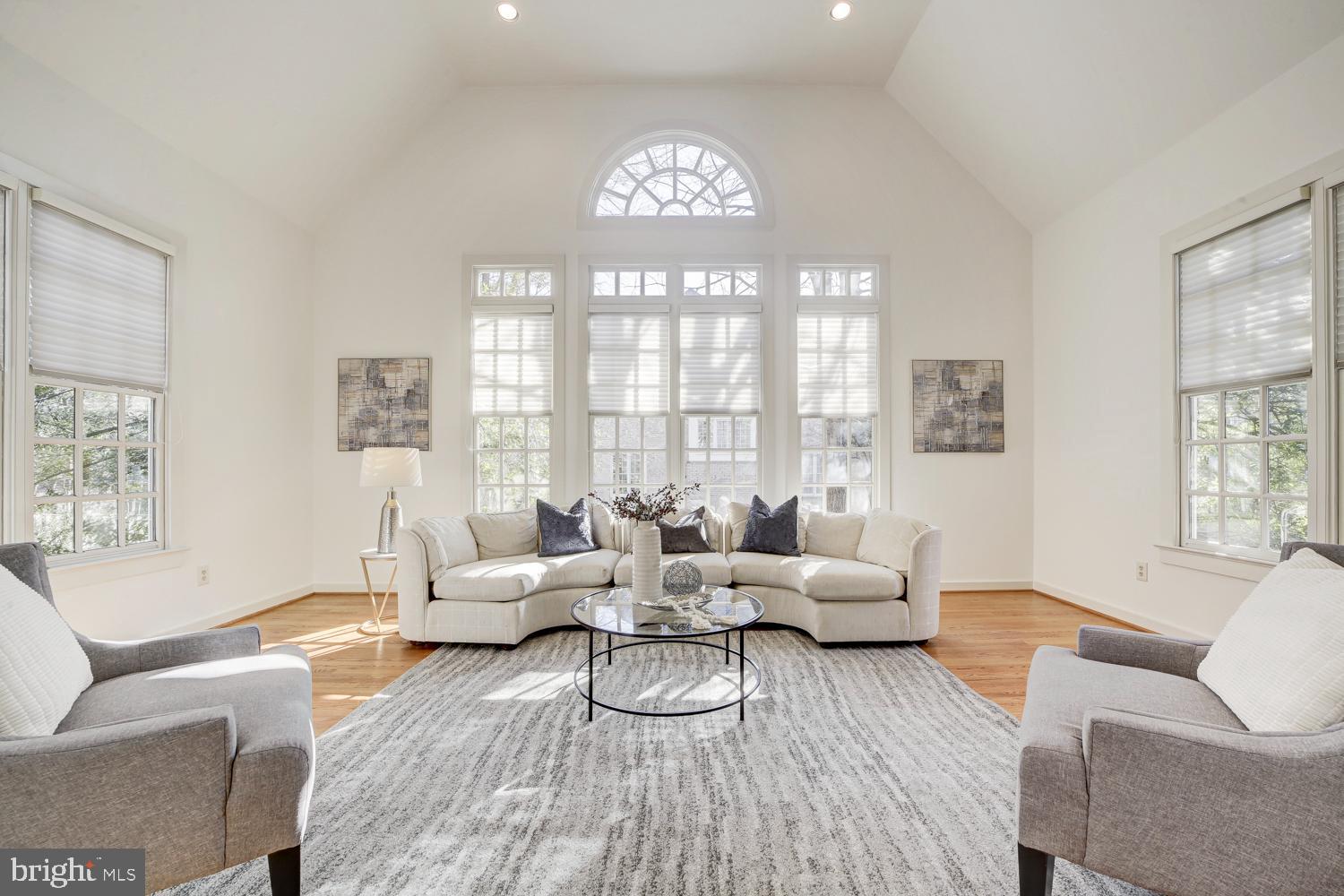 10505 Democracy Lane Potomac, MD 20854 - Photo 5 of 47 a living room with furniture and a large window