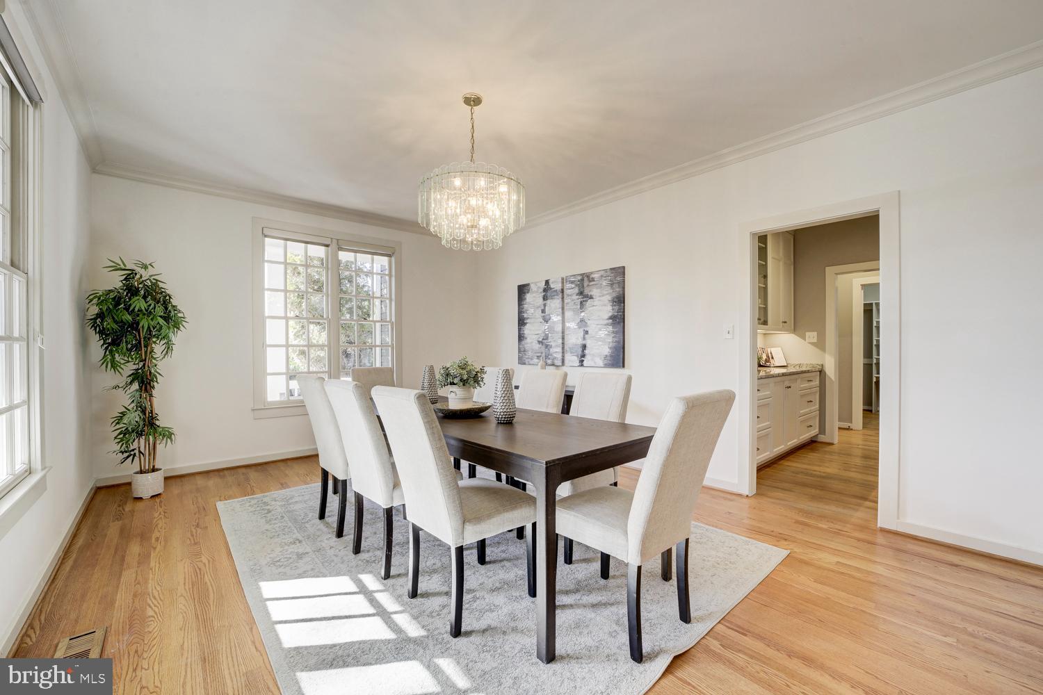 10505 Democracy Lane Potomac, MD 20854 - Photo 8 of 47 a view of a dining room with furniture window and wooden floor