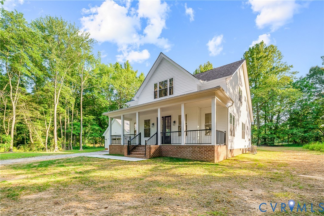 8299 Pamlico Road Ashland, VA 23005 - Photo 34 of 35 a view of a house with a swimming pool