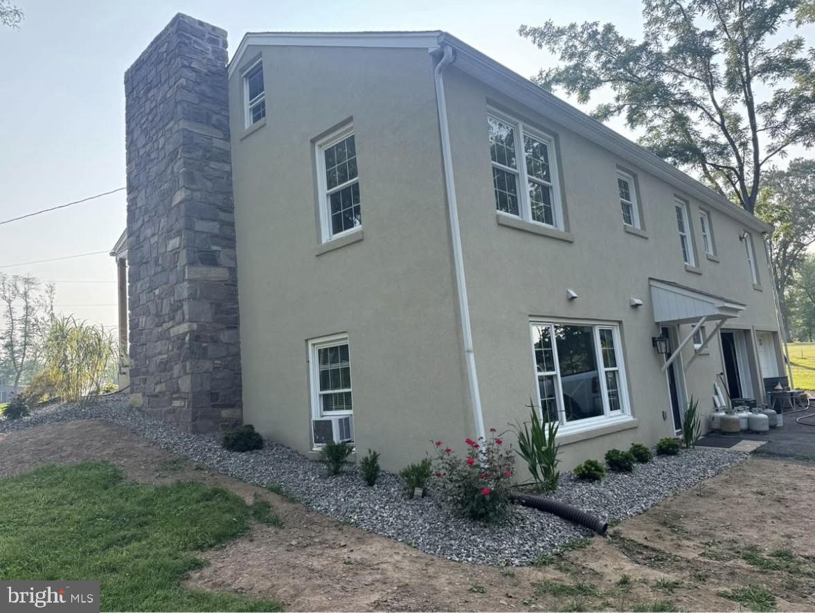 55 Apple Hill Road Furlong, PA 18925 - Photo 2 of 30 a front view of a house with garden