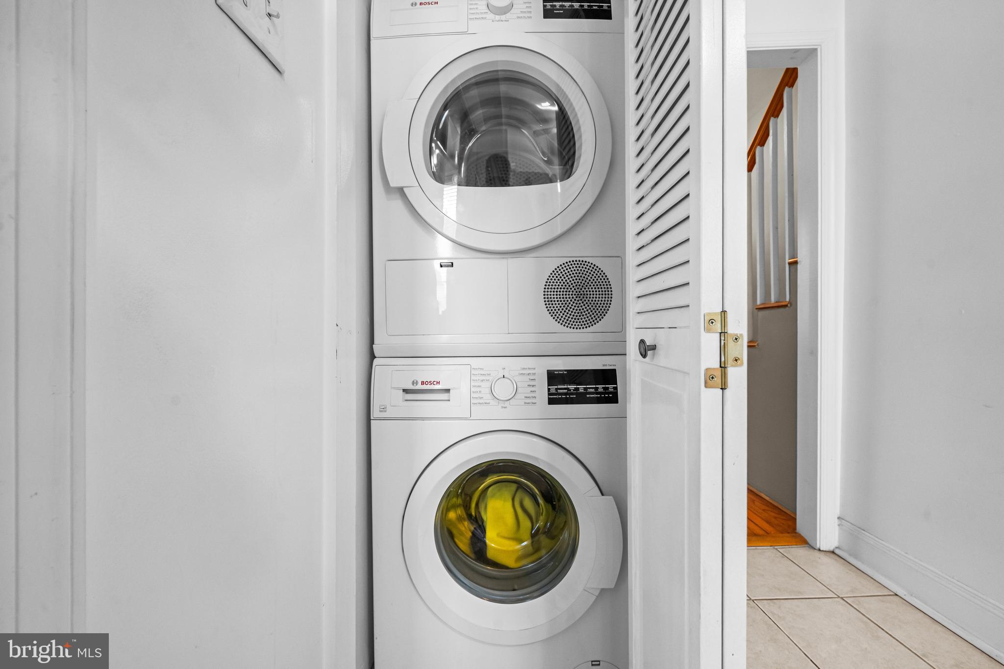 504 Kenyon Street Northwest Washington, DC 20010 - Photo 13 of 38 a utility room with dryer and washer