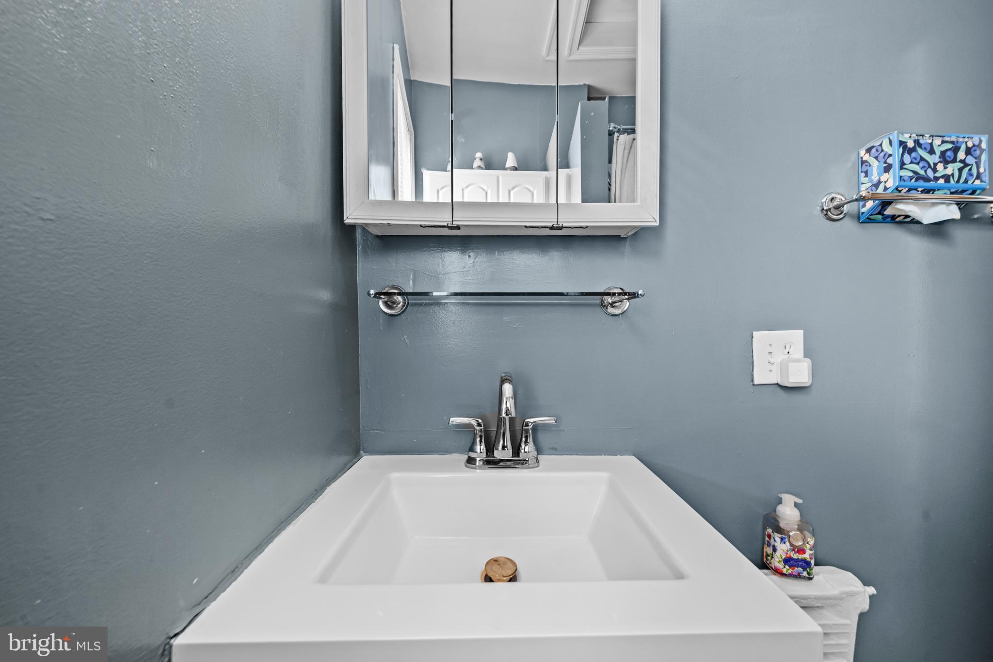 504 Kenyon Street Northwest Washington, DC 20010 - Photo 20 of 38 a bathroom with a sink