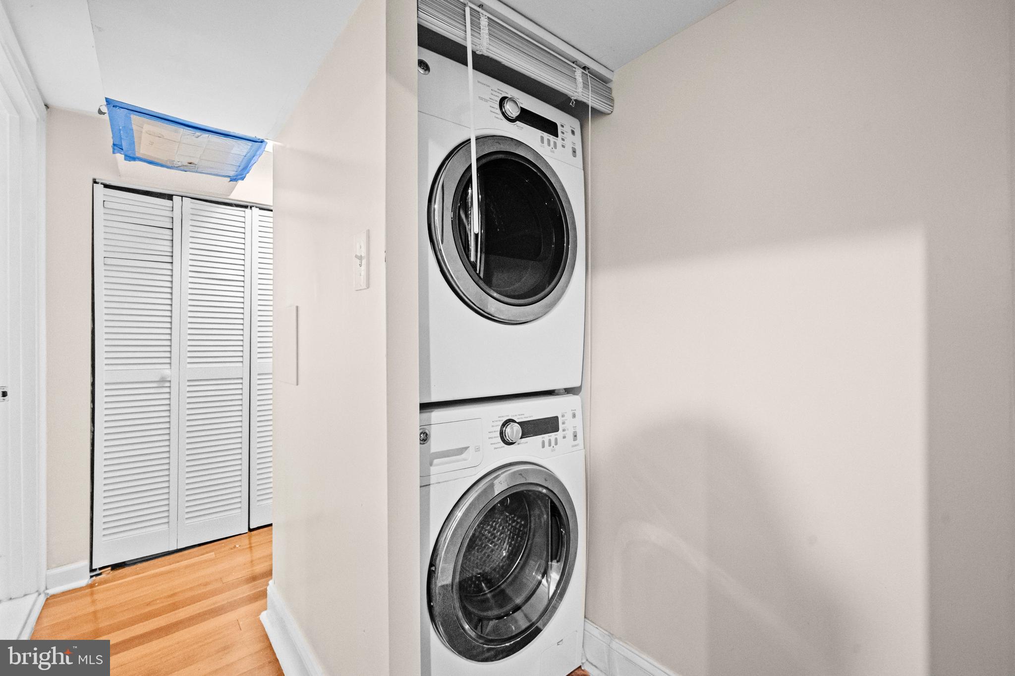 504 Kenyon Street Northwest Washington, DC 20010 - Photo 29 of 38 a utility room with dryer and washer