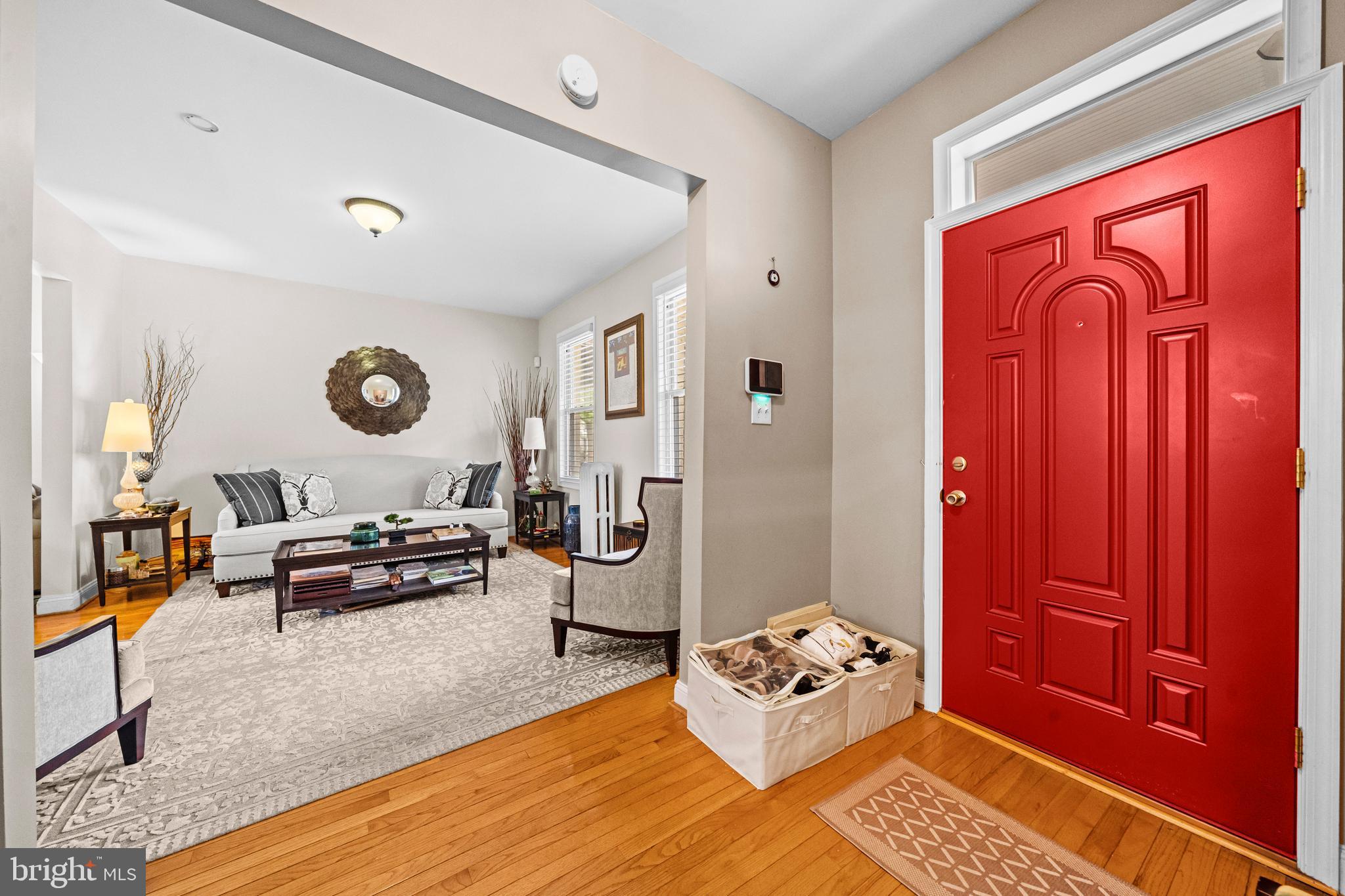 504 Kenyon Street Northwest Washington, DC 20010 - Photo 3 of 38 a living room with furniture and a window