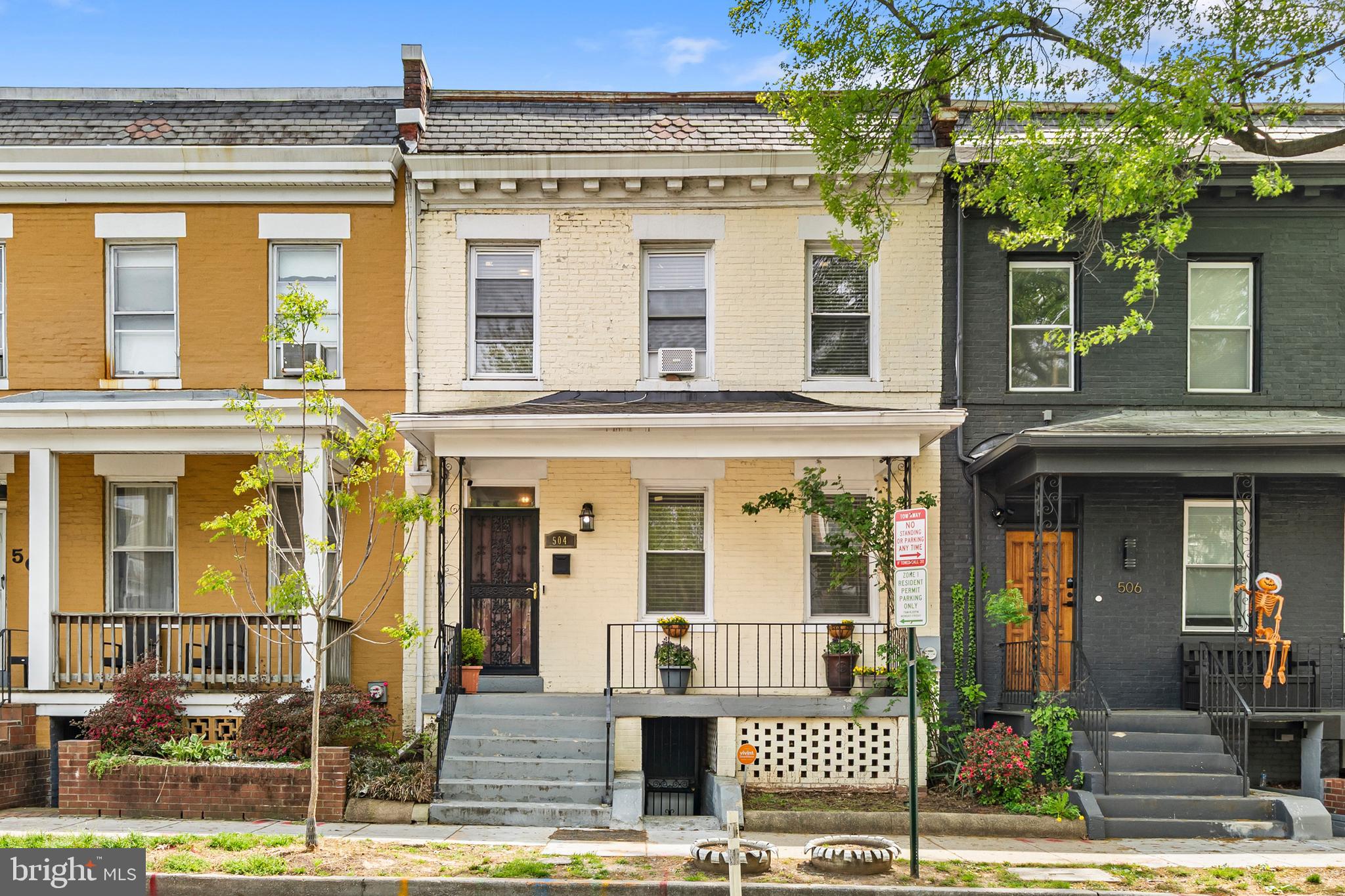 504 Kenyon Street Northwest Washington, DC 20010 - Photo 31 of 38 a front view of a building with street view