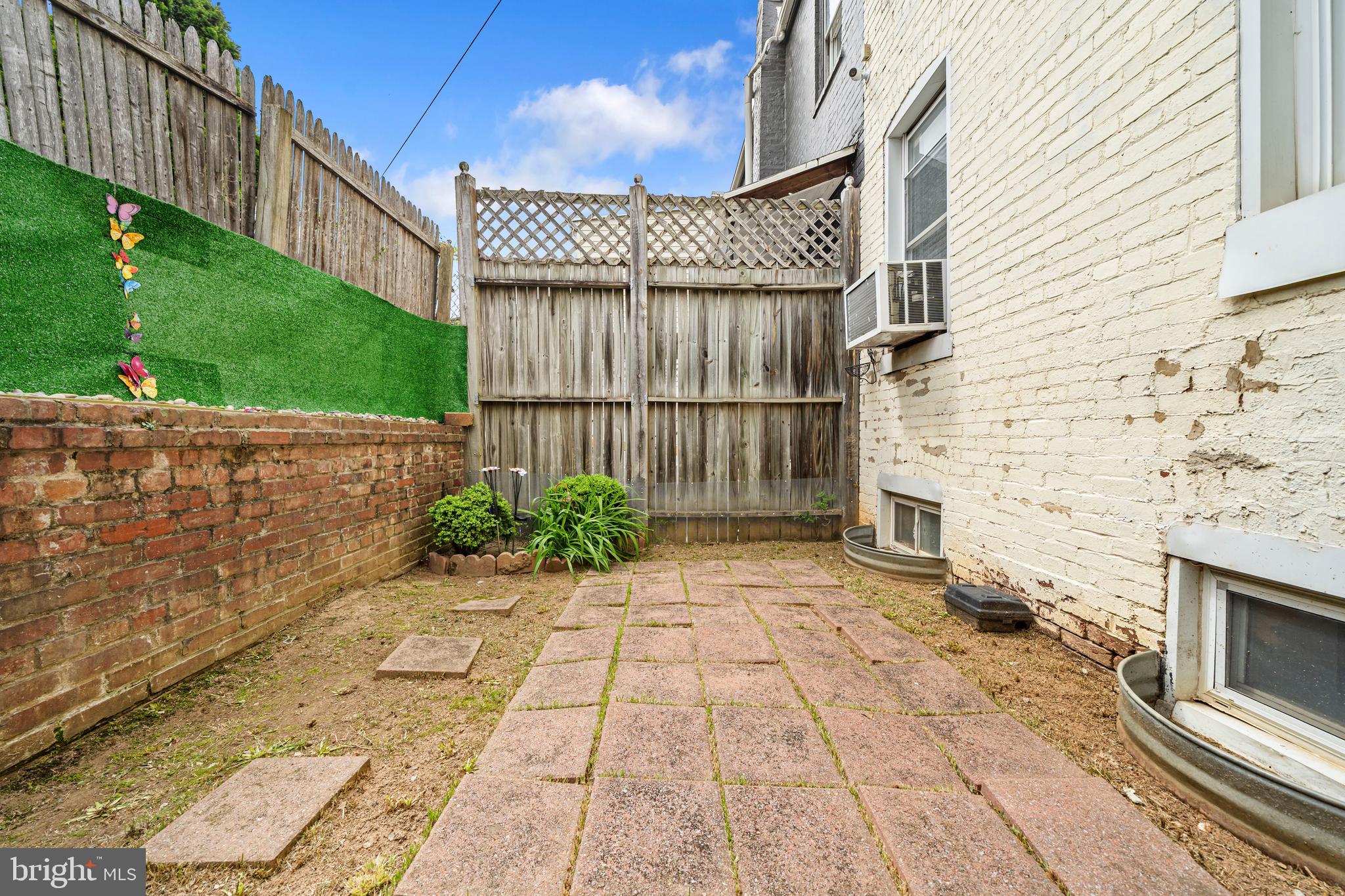 504 Kenyon Street Northwest Washington, DC 20010 - Photo 33 of 38 a view of a pathway with a white house