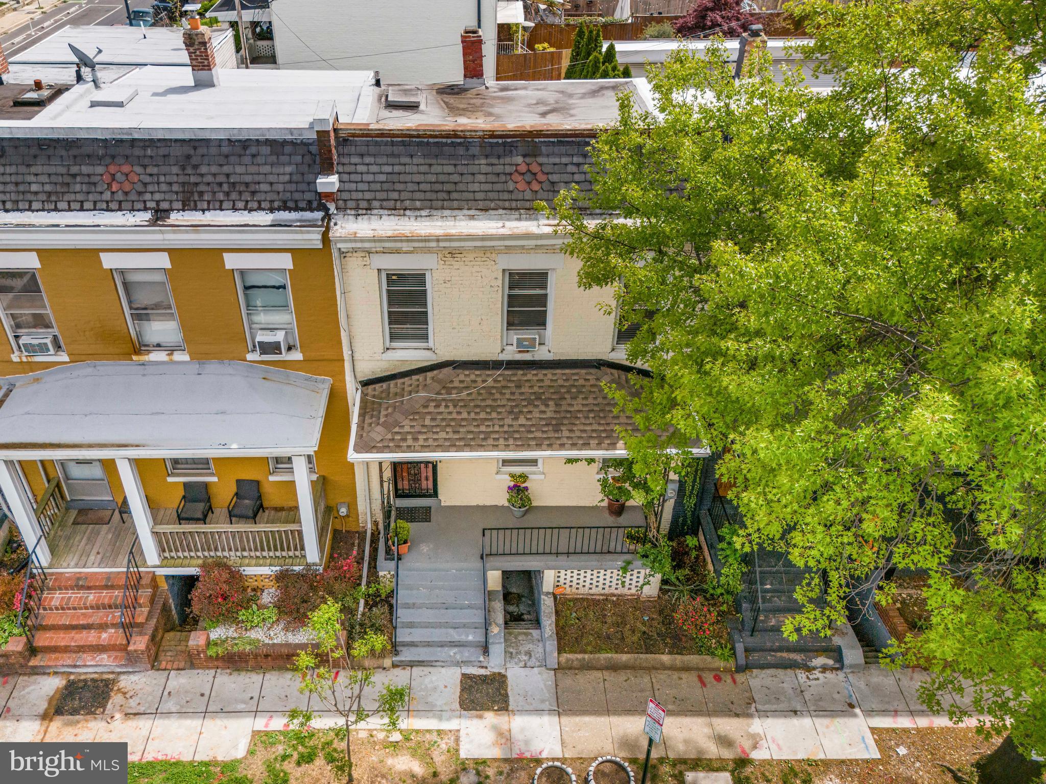 504 Kenyon Street Northwest Washington, DC 20010 - Photo 34 of 38 front view of a house with a yard
