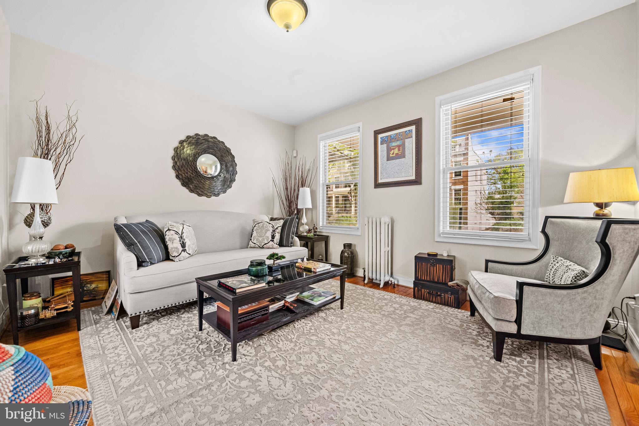 504 Kenyon Street Northwest Washington, DC 20010 - Photo 6 of 38 a living room with furniture and a window