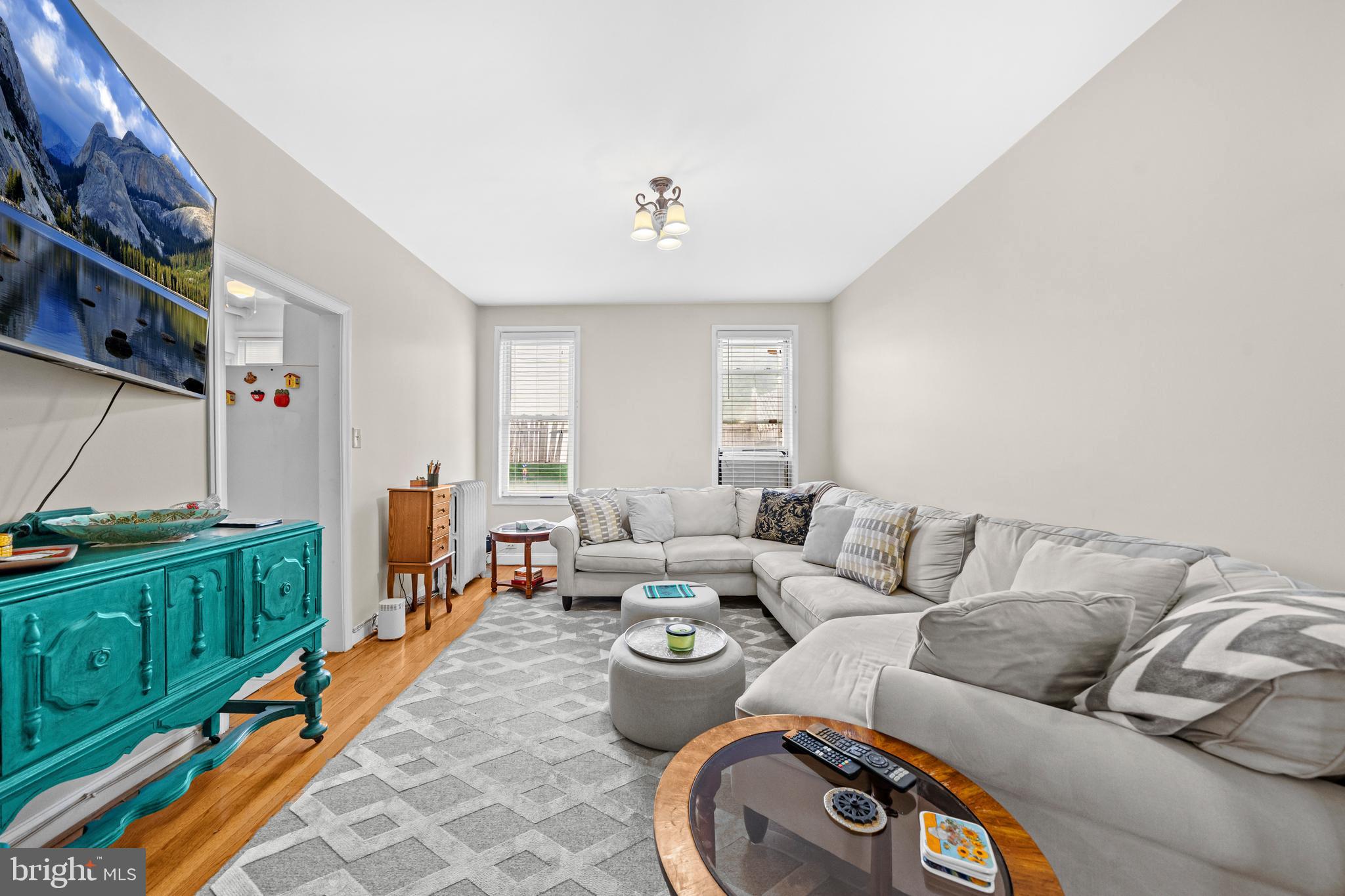 504 Kenyon Street Northwest Washington, DC 20010 - Photo 7 of 38 a living room with furniture and a couch