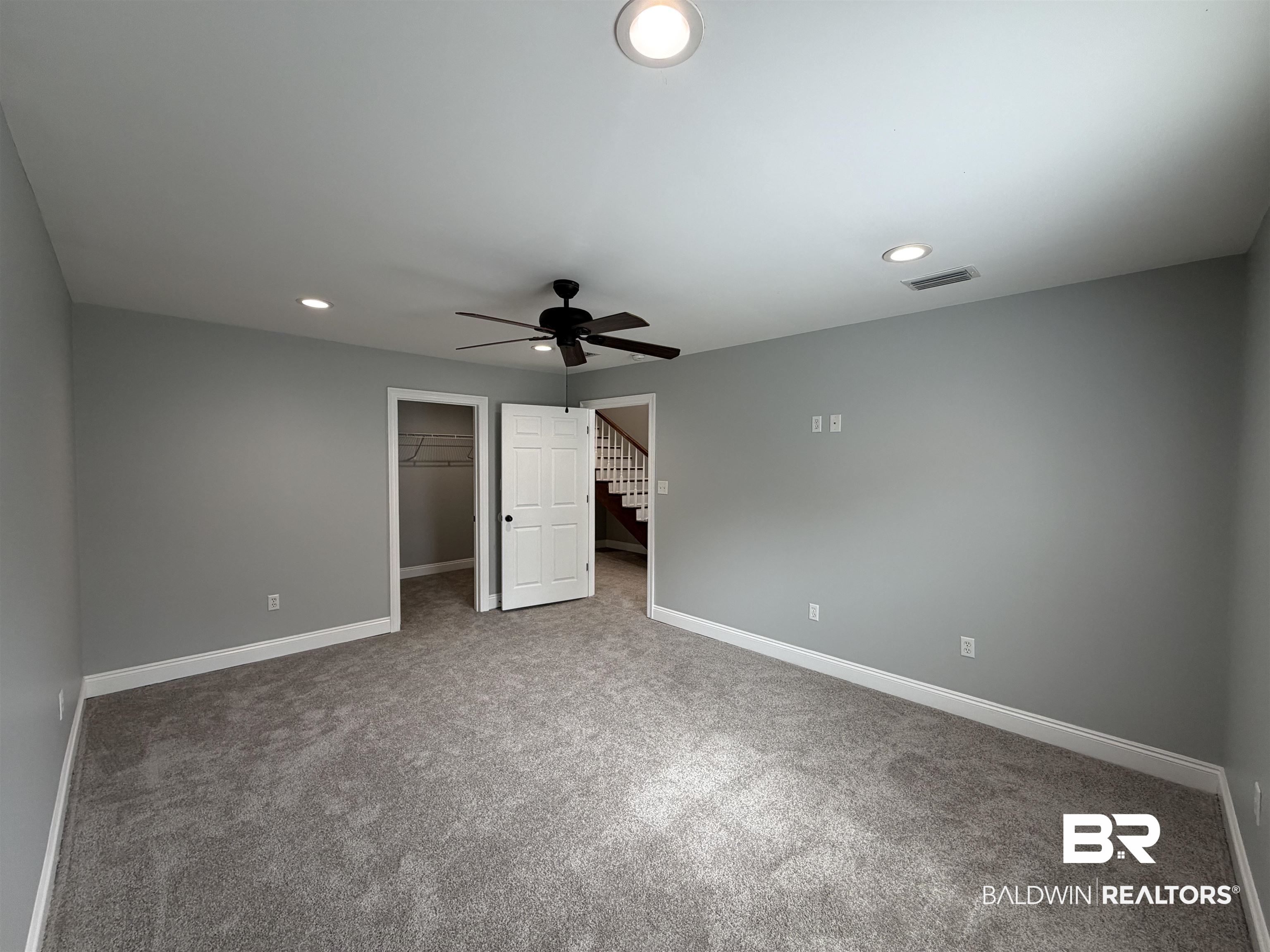 2454 Taylor Avenue Mobile, AL 36606 - Photo 18 of 24 Unfurnished bedroom with a spacious closet, recessed lighting, light colored carpet, and ceiling fan