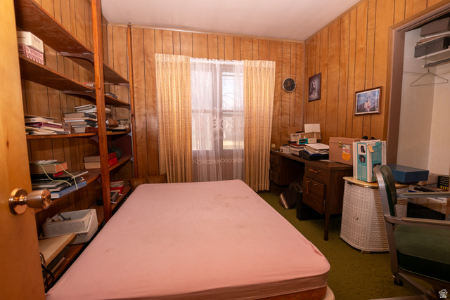 160 North 100 W Street Beaver, UT 84713 - Photo 25 of 36 Home office featuring wood walls and dark colored carpet