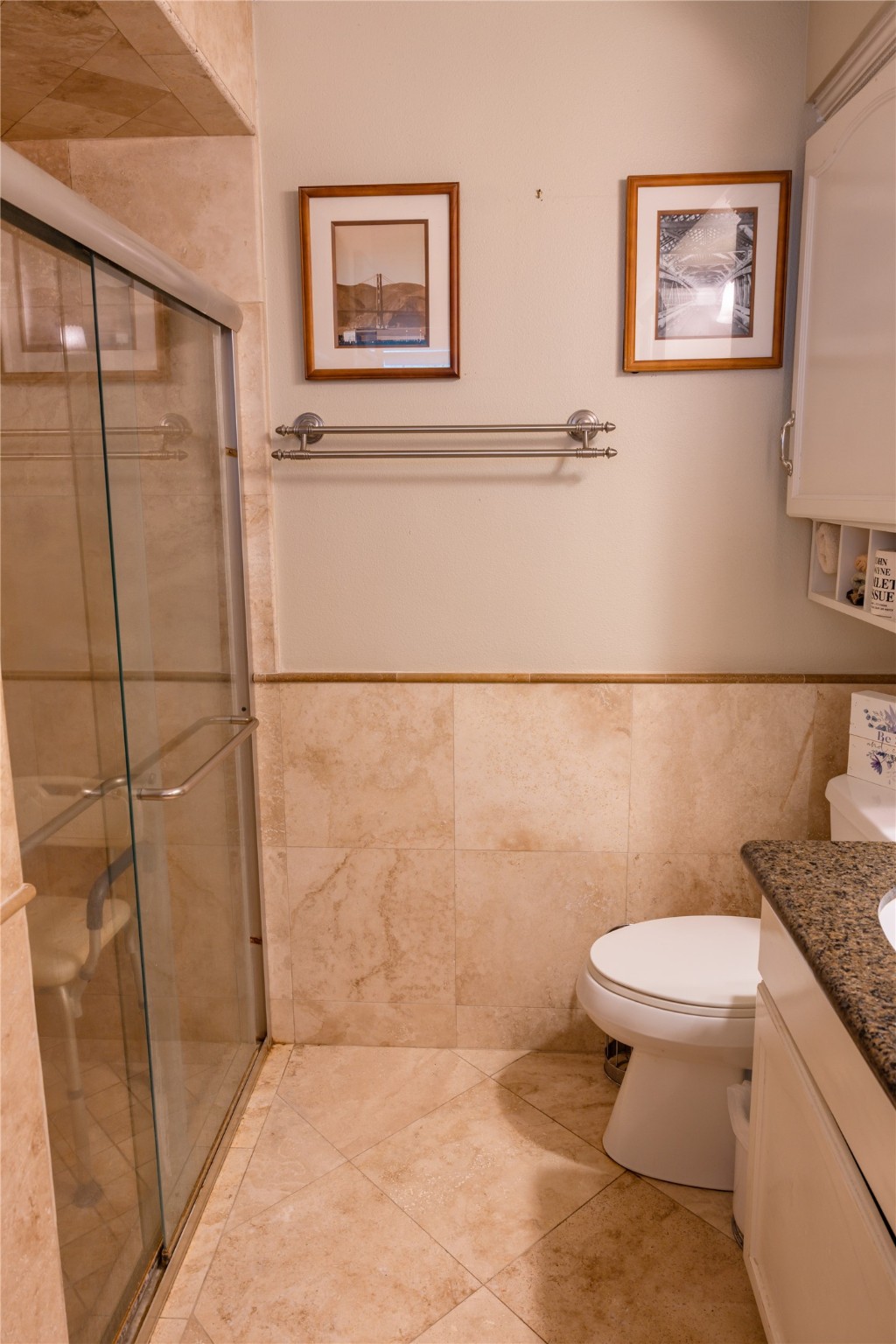 318 Peach Point Road Jones Creek, TX 77541 - Photo 16 of 27 a bathroom with a toilet and a shower