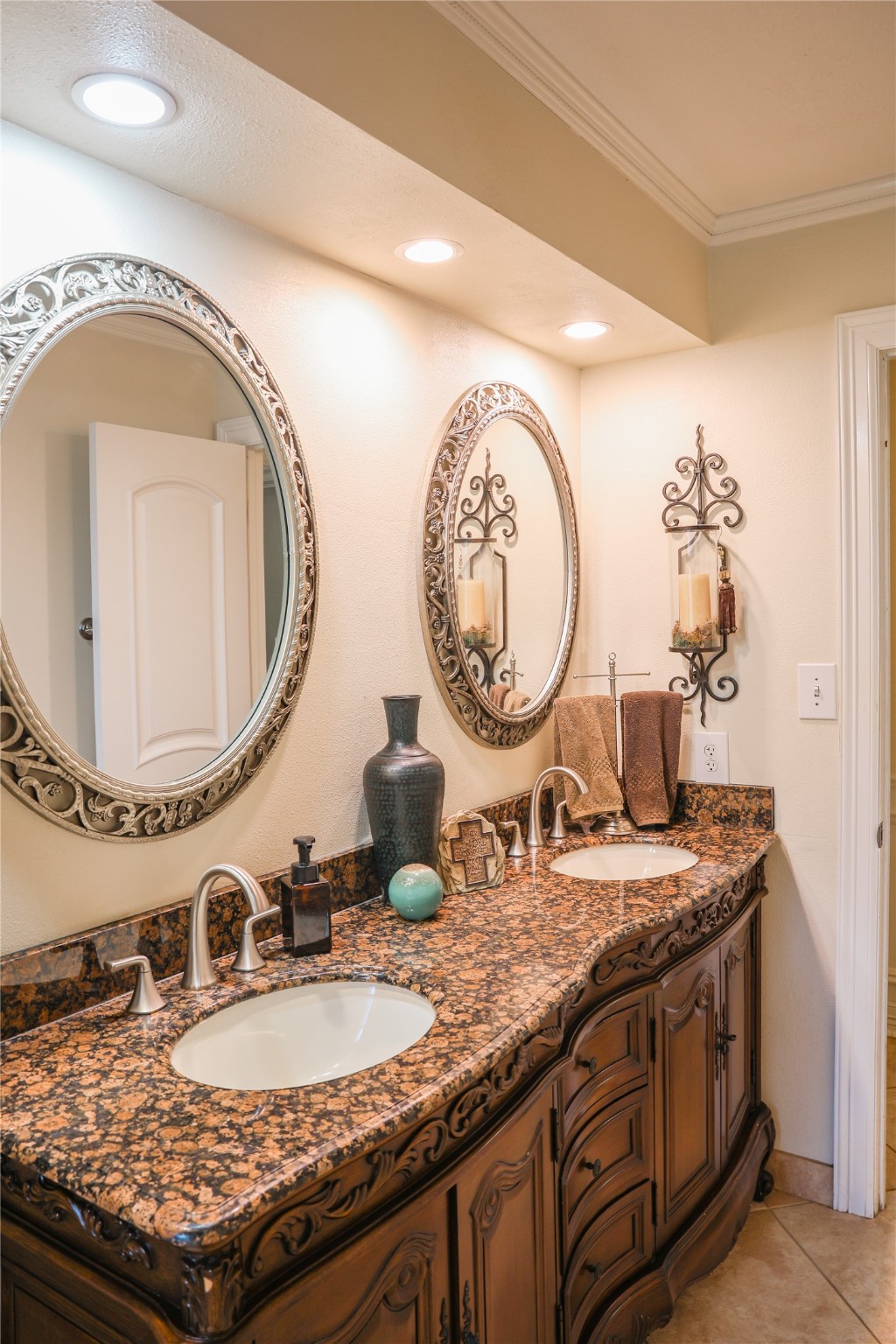 318 Peach Point Road Jones Creek, TX 77541 - Photo 19 of 27 a bathroom with a granite countertop sink and a mirror