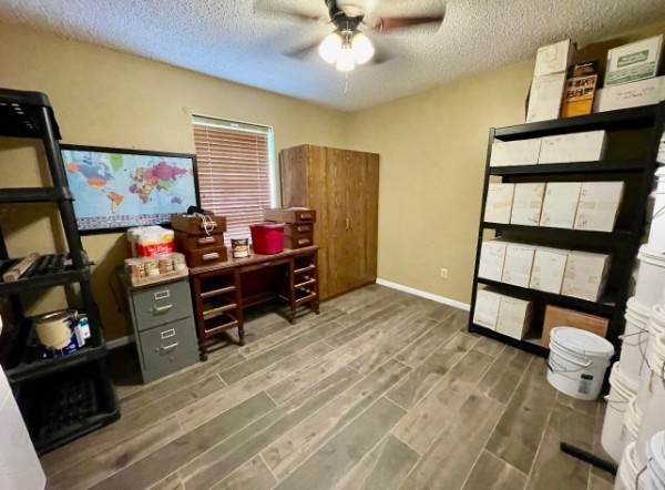 318 Peach Point Road Jones Creek, TX 77541 - Photo 21 of 27 a room with furniture and a flat screen tv