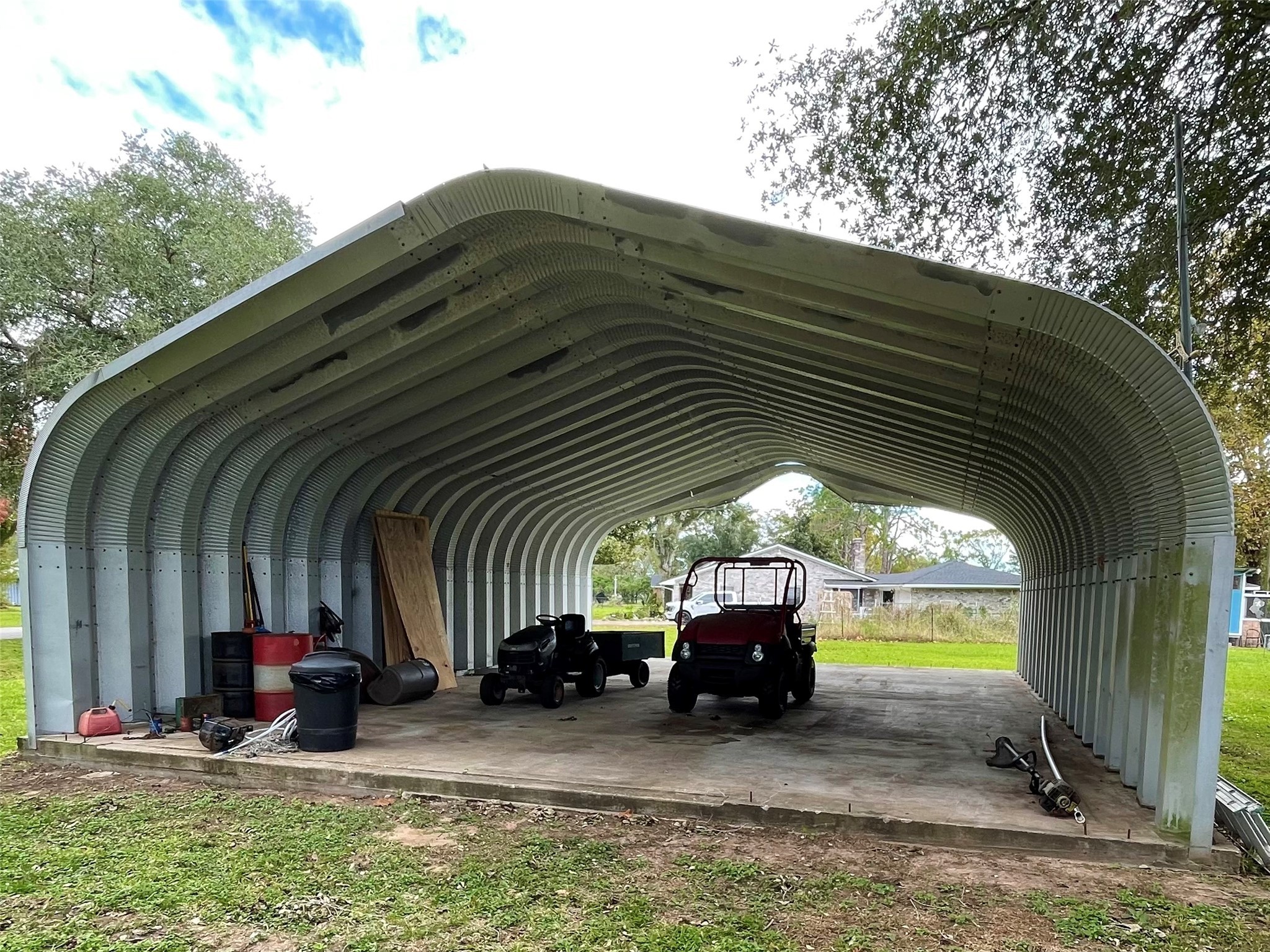 318 Peach Point Road Jones Creek, TX 77541 - Photo 24 of 27 a view of car parked in garage