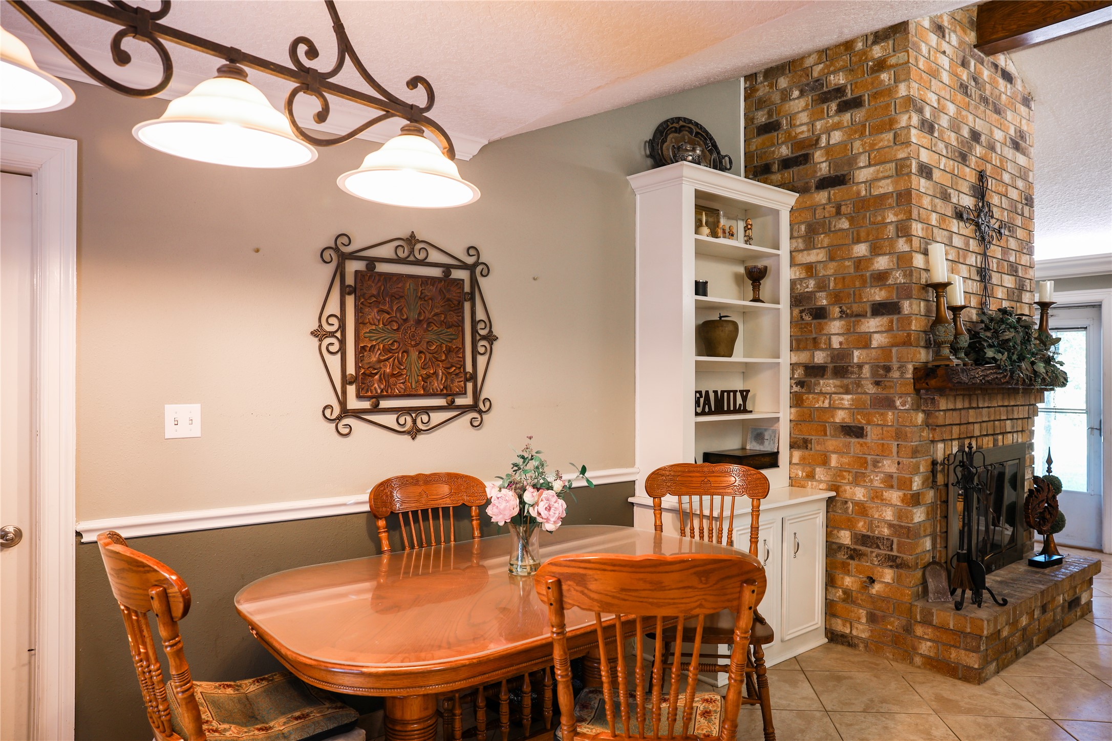 318 Peach Point Road Jones Creek, TX 77541 - Photo 8 of 27 a dining room with furniture and wooden floor