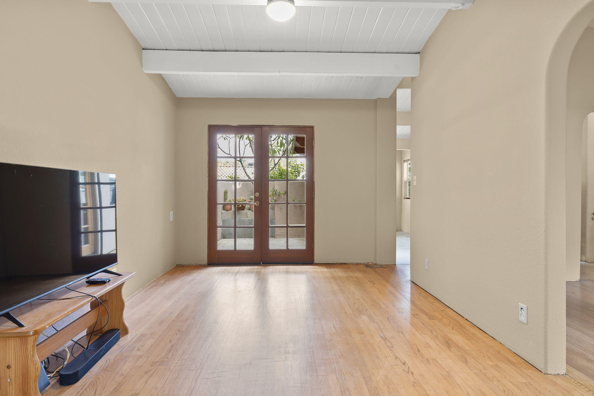 5130 Cathedral Oaks Road Santa Barbara, CA 93111 - Photo 13 of 68 a living room with furniture and a flat screen tv