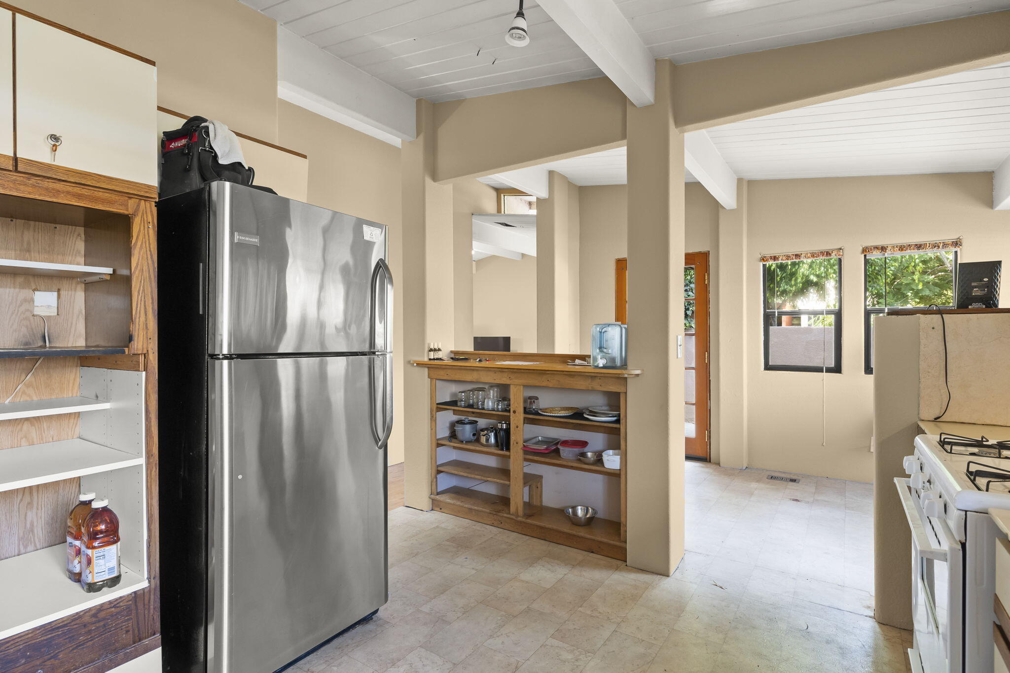 5130 Cathedral Oaks Road Santa Barbara, CA 93111 - Photo 19 of 68 a kitchen with stainless steel appliances a refrigerator and a stove