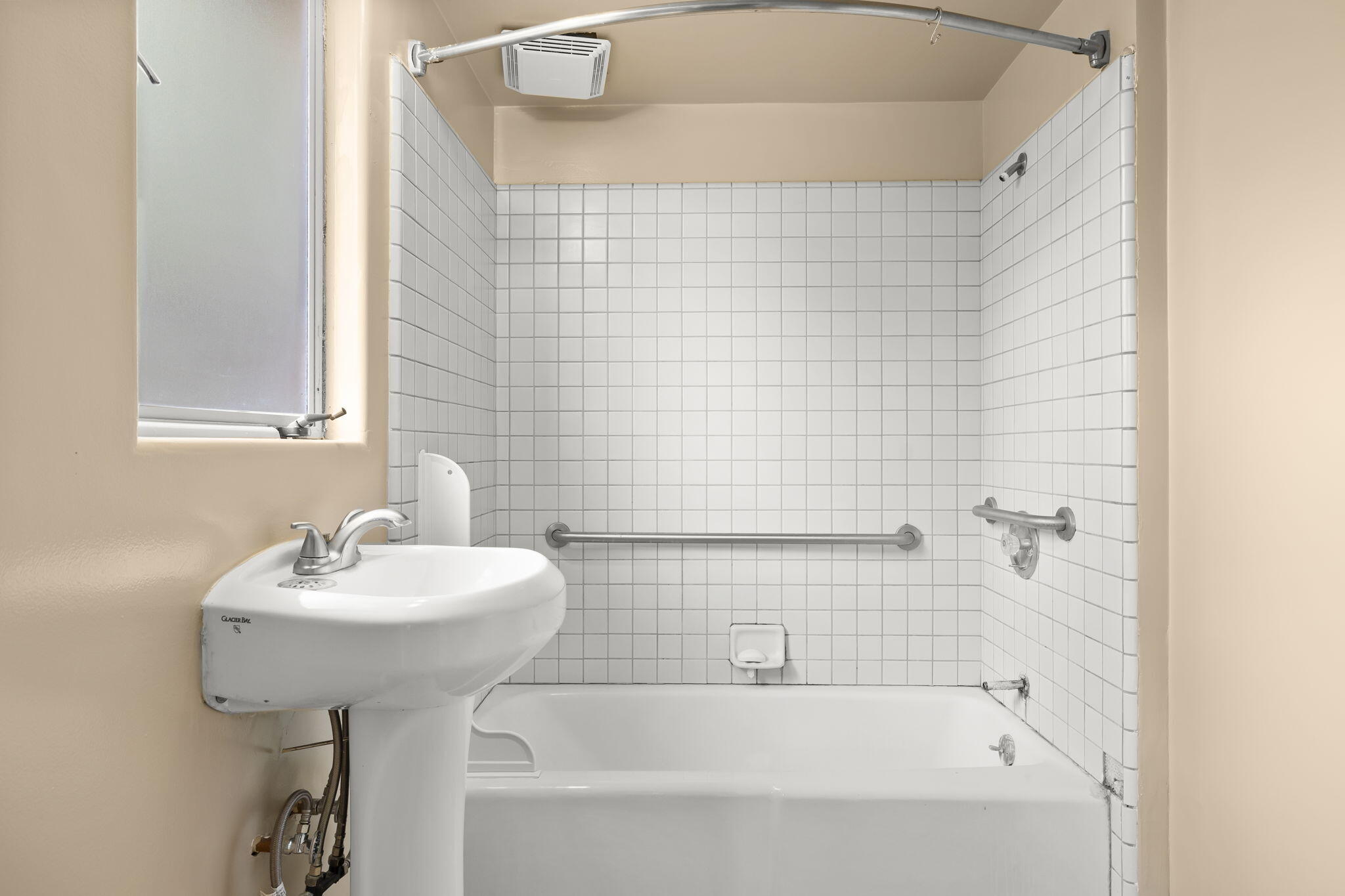 5130 Cathedral Oaks Road Santa Barbara, CA 93111 - Photo 32 of 68 a bathroom with a sink a mirror and shower