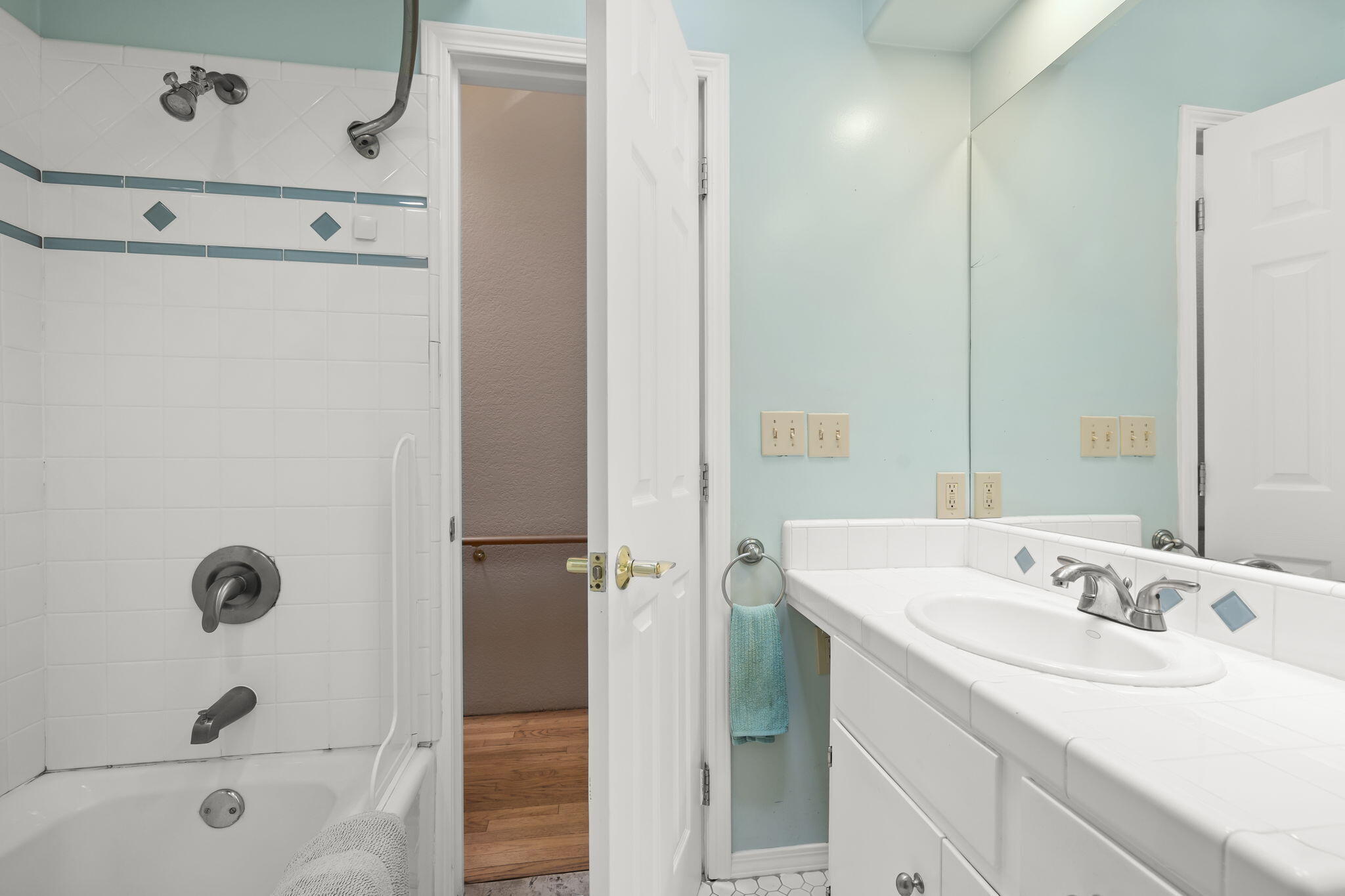 5130 Cathedral Oaks Road Santa Barbara, CA 93111 - Photo 35 of 68 a bathroom with a sink a shower and a mirror