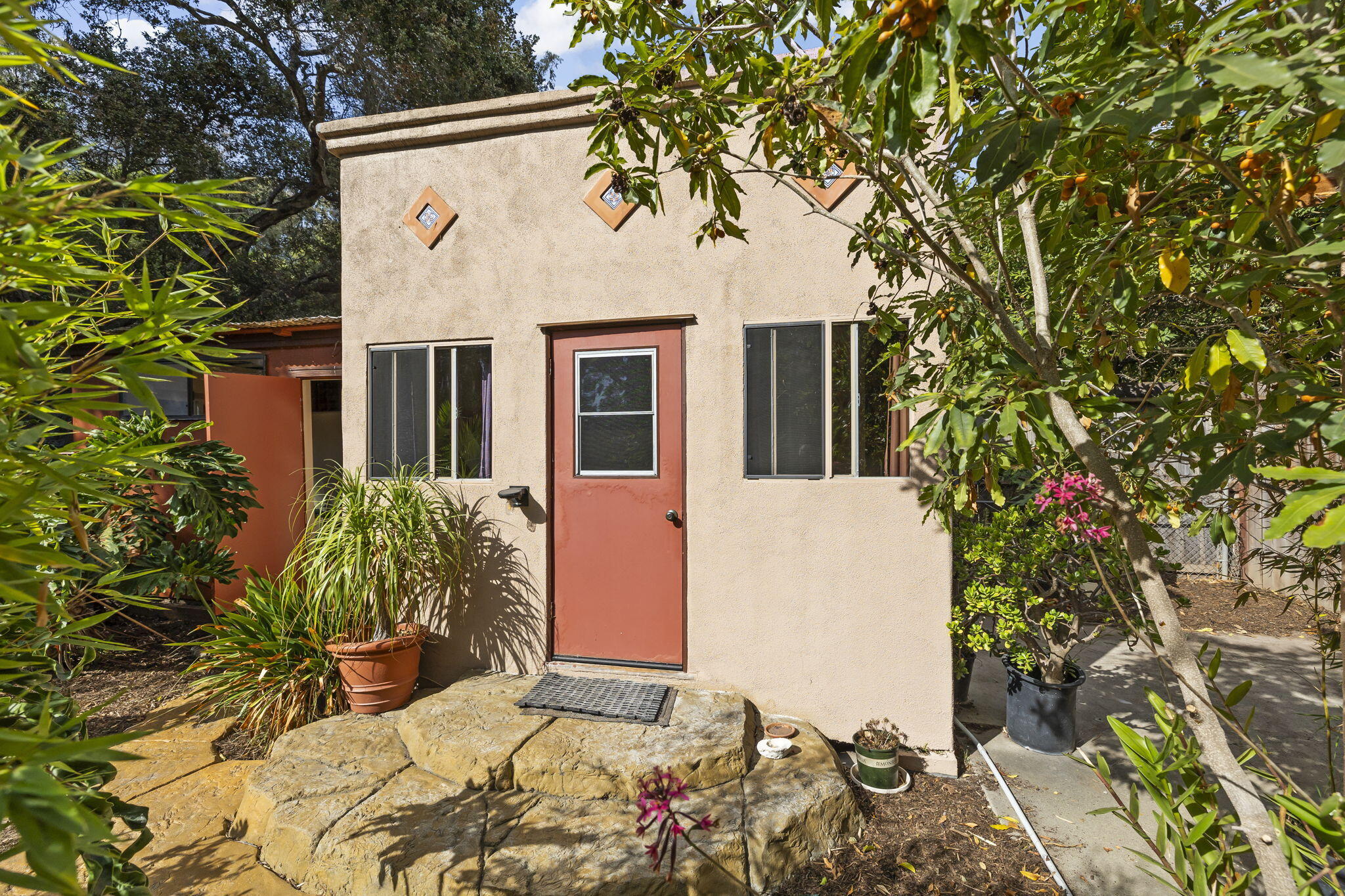 5130 Cathedral Oaks Road Santa Barbara, CA 93111 - Photo 54 of 68 a sign that is on the side of the house
