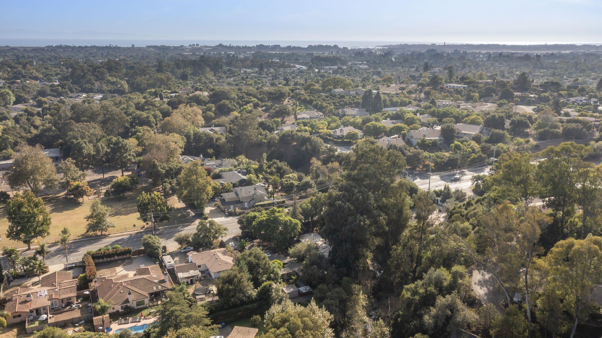 5130 Cathedral Oaks Road Santa Barbara, CA 93111 - Photo 66 of 68 an aerial view of house with yard and mountain view in back