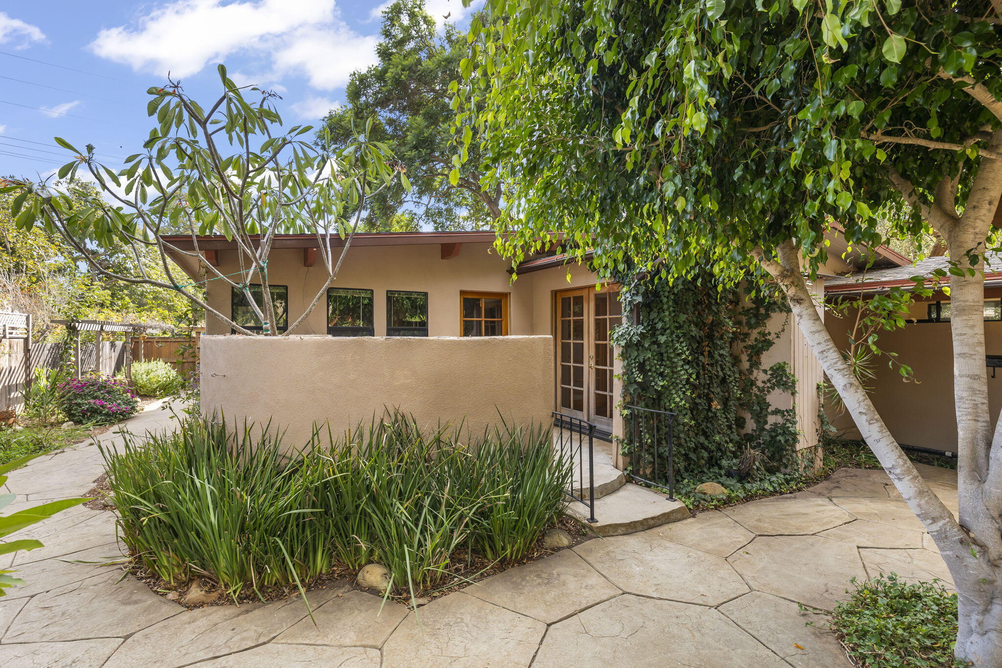 5130 Cathedral Oaks Road Santa Barbara, CA 93111 - Photo 8 of 68 a view of a house with a backyard