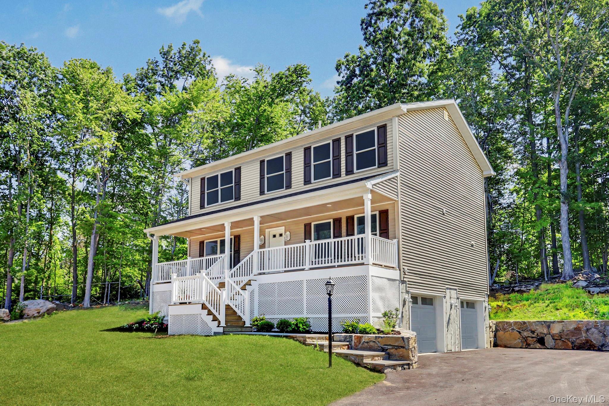 32 Spruce Road Brewster, NY 10509 - Photo 2 of 21 Exterior with two car garage