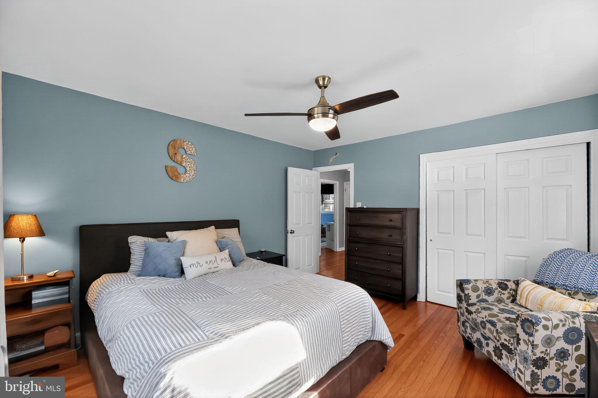 1201 Wayne Road Haddonfield, NJ 08033 - Photo 17 of 36 a bedroom with a bed and wooden floor