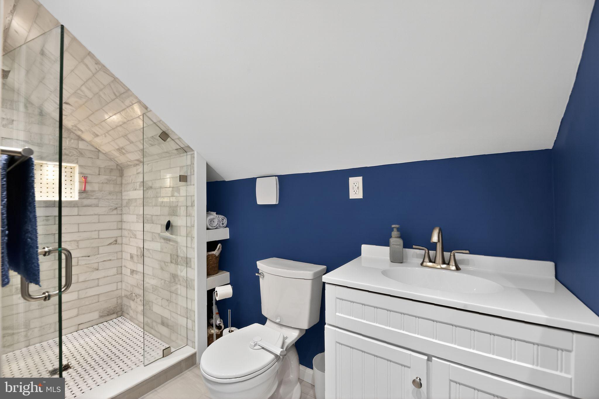 1201 Wayne Road Haddonfield, NJ 08033 - Photo 26 of 36 a bathroom with a sink a toilet and shower