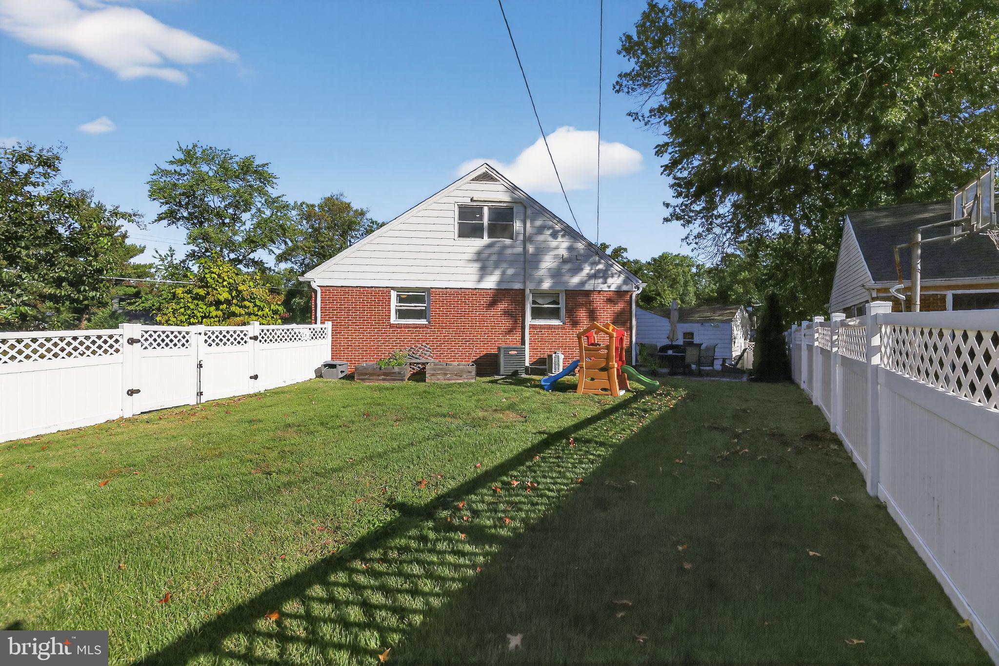 1201 Wayne Road Haddonfield, NJ 08033 - Photo 31 of 36 a front view of a house with garden