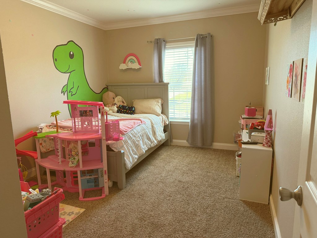 5200 Rr 1120 Rio Frio, TX 78879 - Photo 15 of 39 a bedroom with a bed and a window